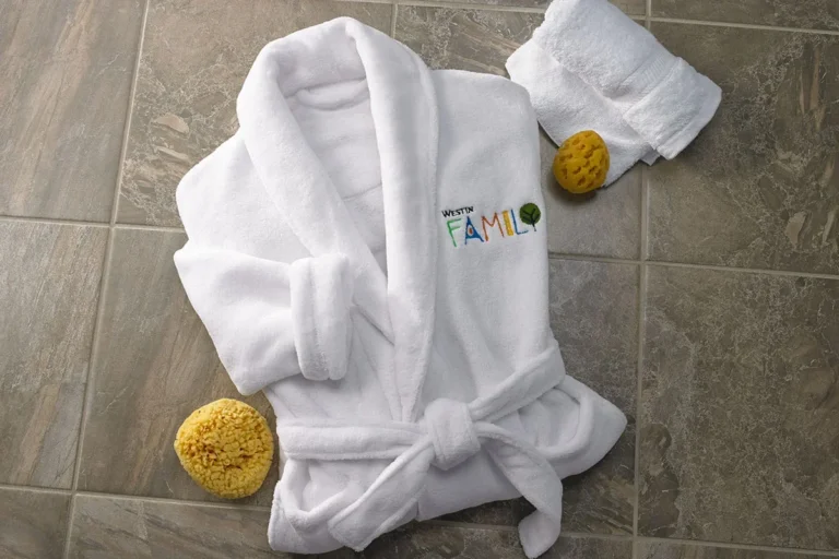 Smaller-sized kids terry-cloth bathrobe sized for resort kids' club ages 4-14