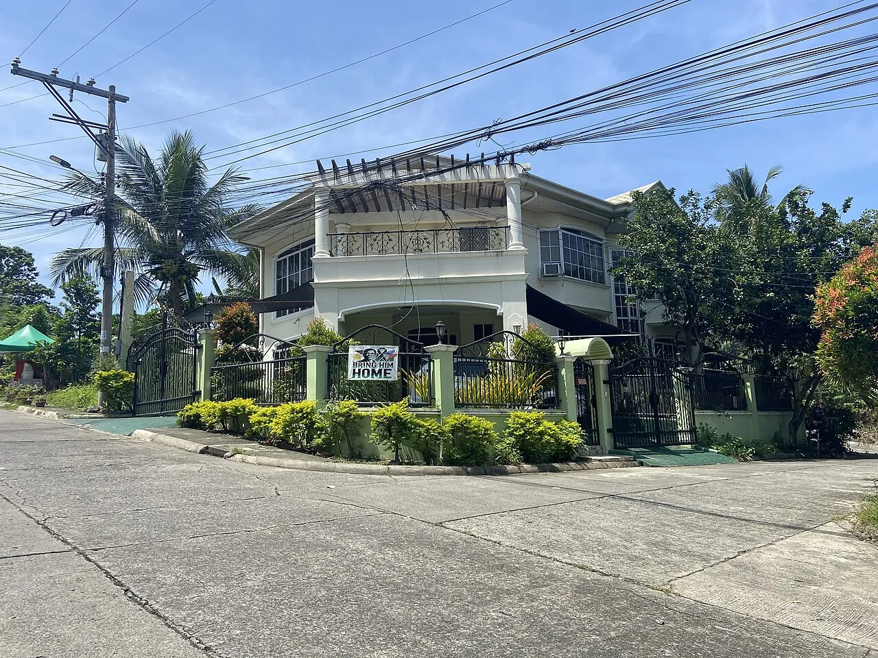 House exterior in Davao City with Duterte message banner