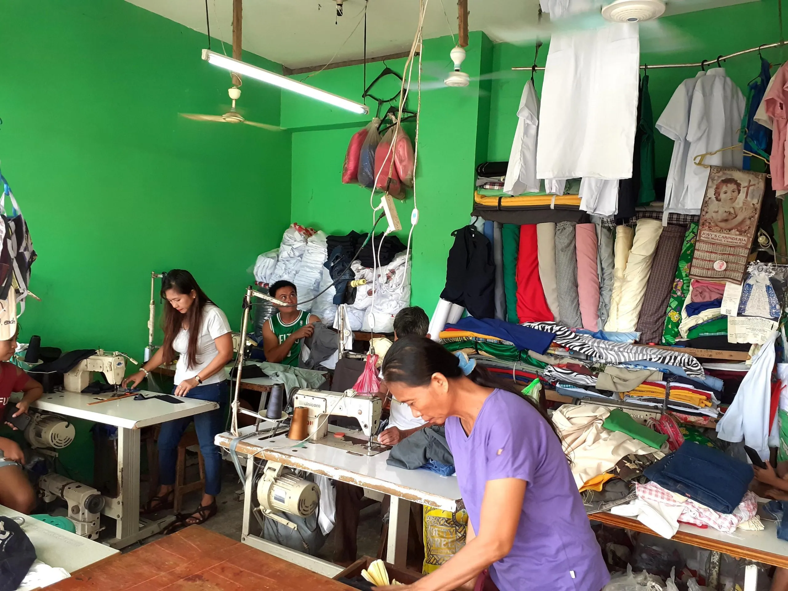 Sewing floor and industrial machines inside our Tagum City patahian workshop