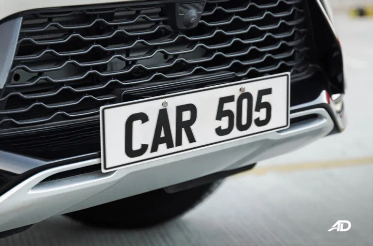 Custom CAR 505 plate mounted on car front grille with custom acrylic build