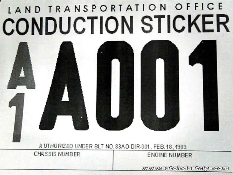 Conduction sticker AA0001 in bold black stencil lettering on white backing