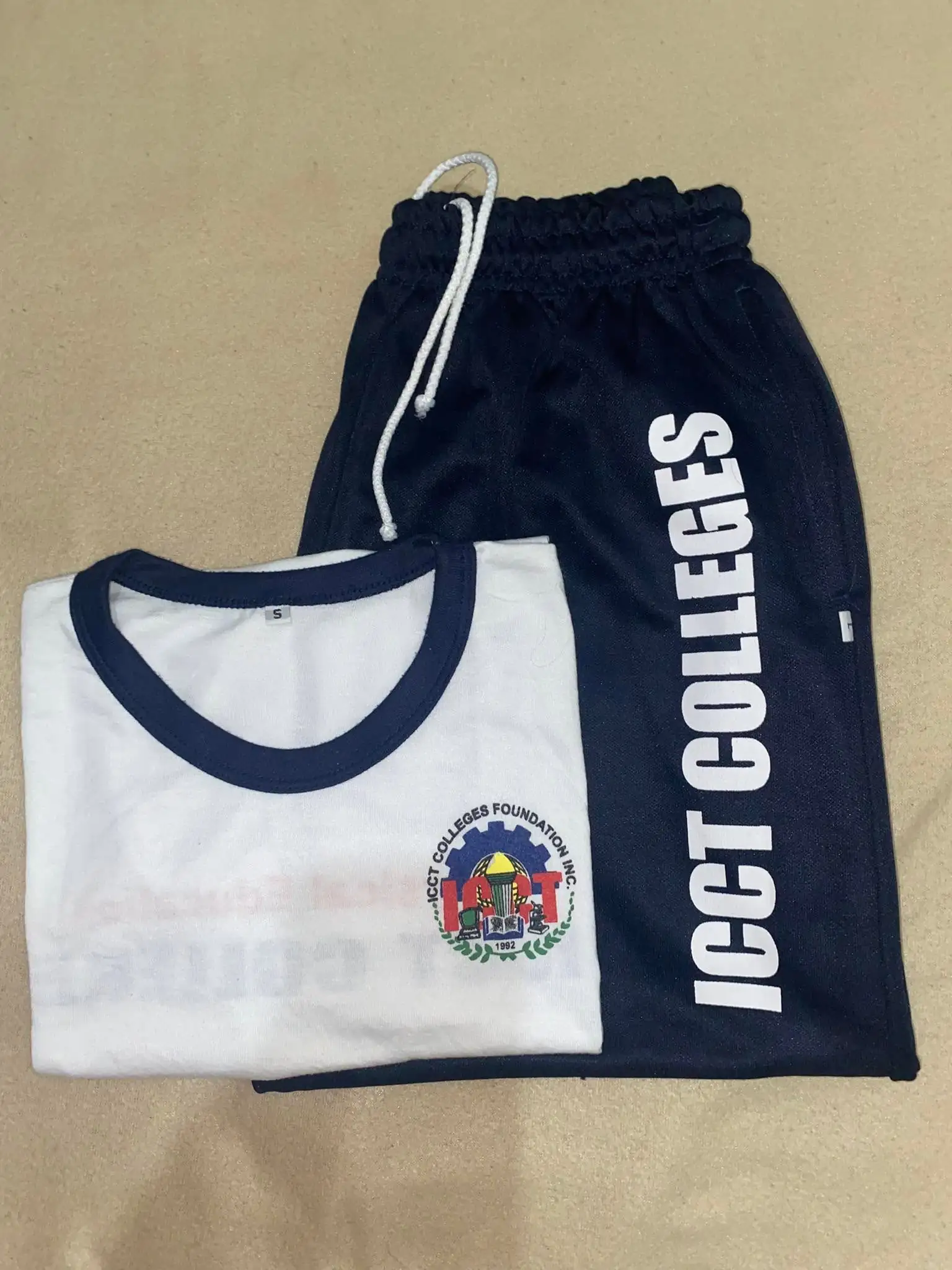 ICCT Manila PE uniform - printed PE shirt and matching jogging pants in ICCT navy-and-white