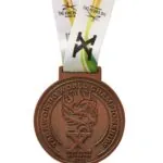 Die-cast zinc-alloy medal sample with detailed 3D relief and ribbon, front view