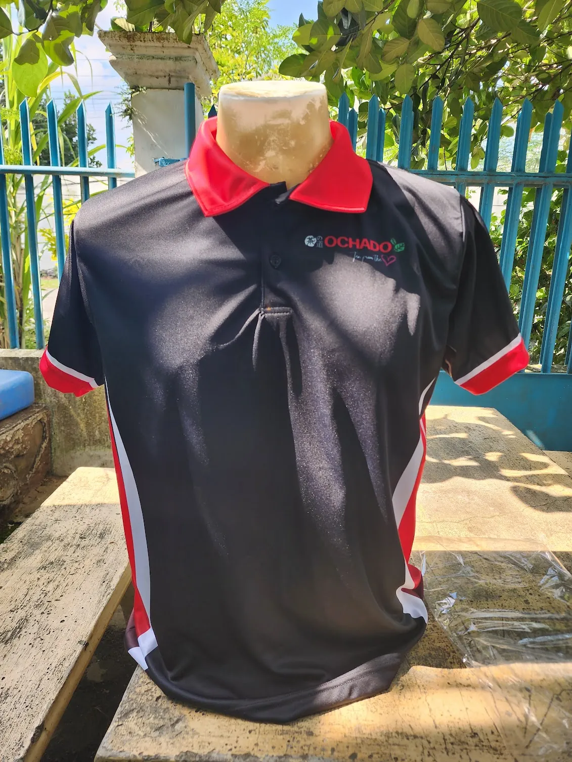 Custom embroidered performance golf polo with club crest