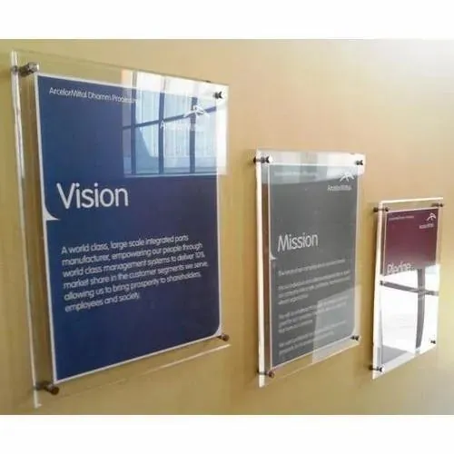 Acrylic display and signage pieces including sign holders, name plates, and award plaques