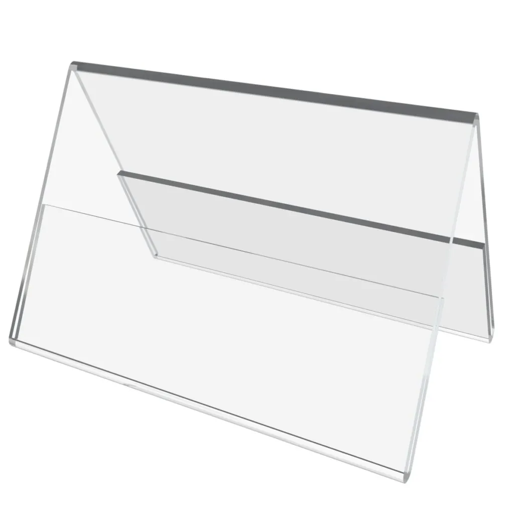 Clear acrylic table and tent sign holders on a counter