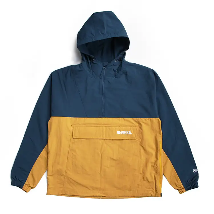 Technical waterproof running jacket inspection showing seam sealing and vents