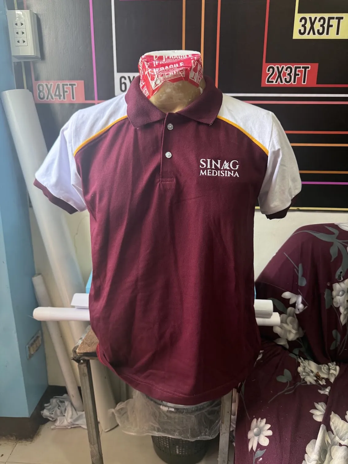 Staff wearing coordinated corporate apparel uniforms